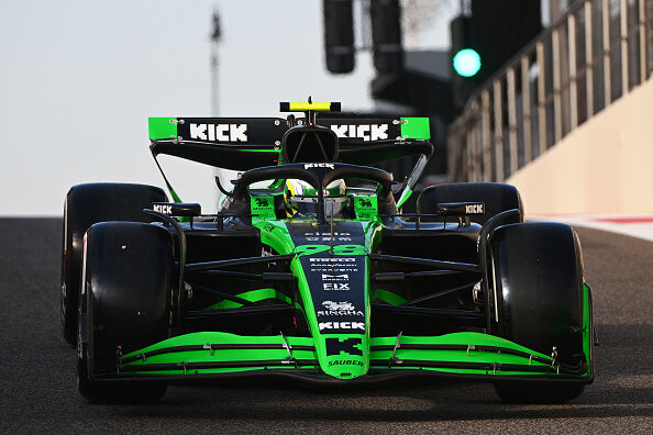 green and black Sauber race car